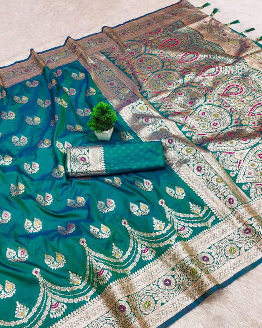 Teal saree with intricate patterns on a beige background